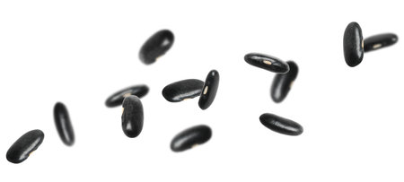 Many black beans falling on white background, banner design. Vegan dietの写真素材
