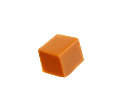 One caramel cube isolated on white. Confectioneryの写真素材