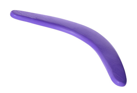 Purple boomerang isolated on white. outdoor activityの写真素材