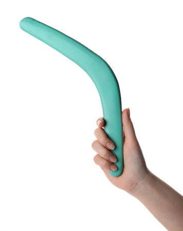 Woman holding turquoise boomerang on white background, closeupの写真素材