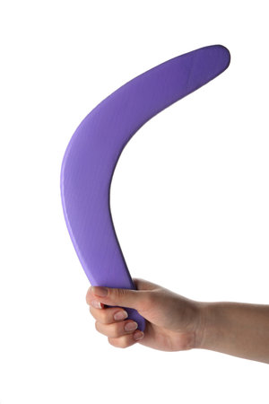 Woman holding purple boomerang on white background, closeupの写真素材