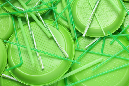 Different green plastic items as background, closeupの写真素材