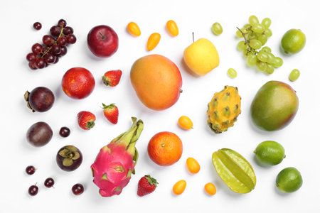 Many different delicious exotic fruits on white background, flat layの写真素材