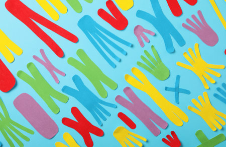 Different kinesio tape pieces on light blue background, flat layの写真素材