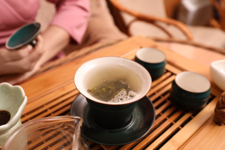 Traditional tea ceremony. Master near tools and tray, closeupの写真素材