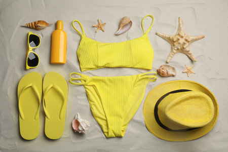 Flat lay composition with beach objects on sandの写真素材