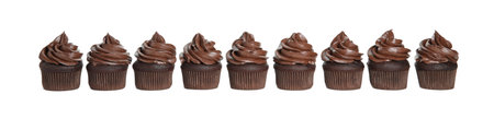 Delicious chocolate cupcakes with cream on white backgroundの写真素材