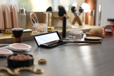 Many different cosmetic products on dressing table indoorsの写真素材