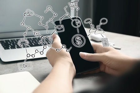 Woman using smartphone for online payment, closeupの写真素材