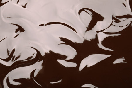 Delicious chocolate cream as background, closeup viewの写真素材
