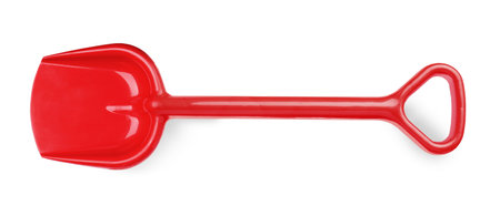 Red plastic toy shovel isolated on white, top viewの写真素材
