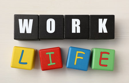 Different cubes with words Life and Work on white wooden table, flat lay. Balance conceptの写真素材