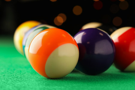 Many colorful billiard balls on green table, closeupの写真素材