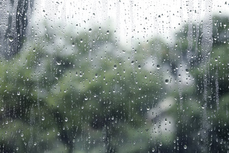 Window glass with raindrops as background, closeupの写真素材