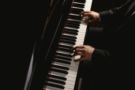 Man playing piano, above view. talented musicianの写真素材
