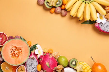 Different exotic fruits on beige background, flat lay. Space for textの写真素材