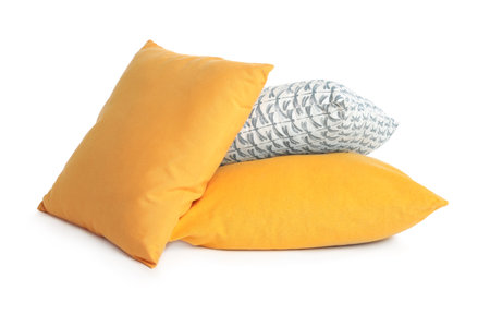Different colorful decorative pillows on white backgroundの写真素材