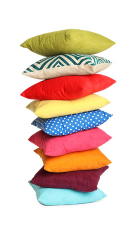 Stack of colorful decorative pillows on white backgroundの写真素材