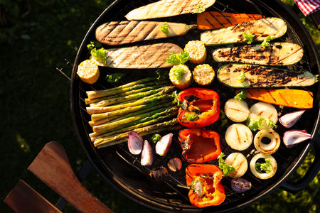 Delicious grilled vegetables on barbecue grill outdoors, top viewの写真素材