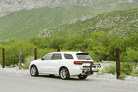 Beautiful view of car on roadside in mountains. road trip