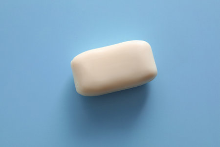 Soap bar on light blue background, top viewの写真素材