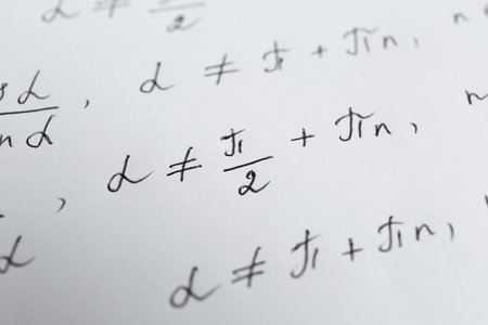 Sheet of paper with different mathematical formulas, closeupの写真素材