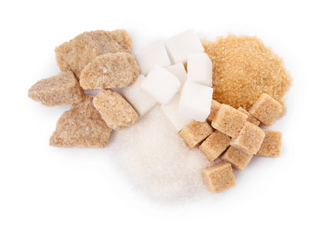 Different types of sugar on white background, top viewの写真素材