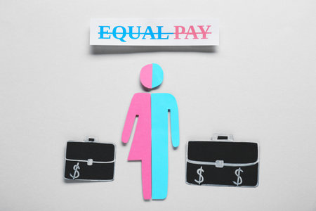 Equal pay concept. Human paper figure as male and female halves against light gray background, flat layの写真素材