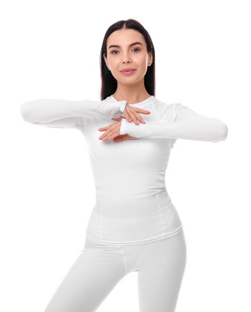 Woman in warm thermal underwear on white backgroundの写真素材