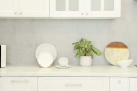 Blurred view of modern kitchen. interior designの写真素材