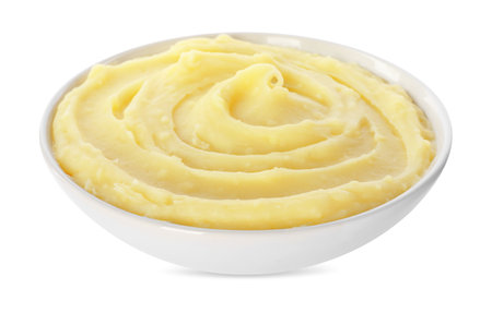 Bowl of tasty mashed potato isolated on whiteの写真素材