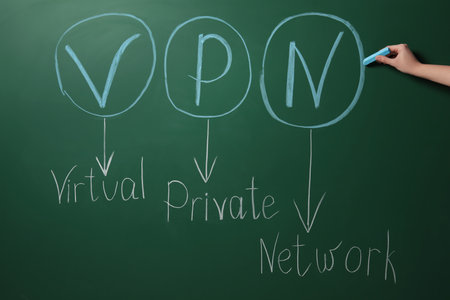 Woman writing VPN (Virtual Private Network) on chalkboard, closeupの写真素材