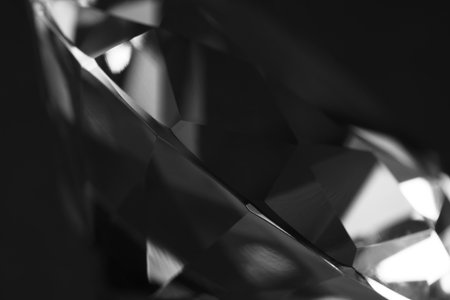 Beautiful dazzling diamond on dark background, closeup. Precious gemstoneの写真素材