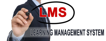 learning management system. Businessman circling abbreviation LMS on glass board, closeup. White background, banner designの写真素材