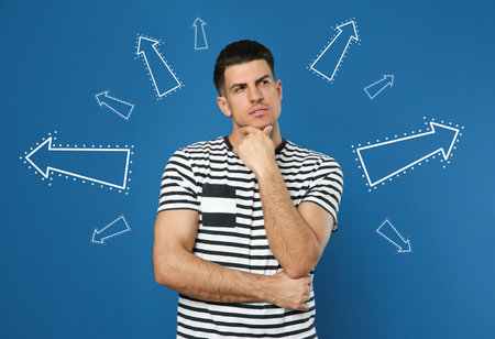 Choice in profession or other areas of life, concept. Making decision, thoughtful man surrounded by...
