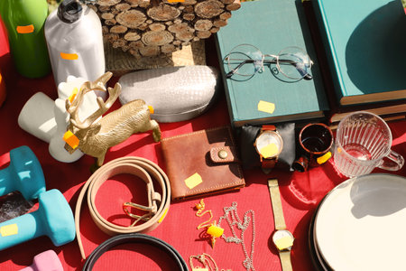 Many different items on table outdoors, above view. Garage saleの写真素材