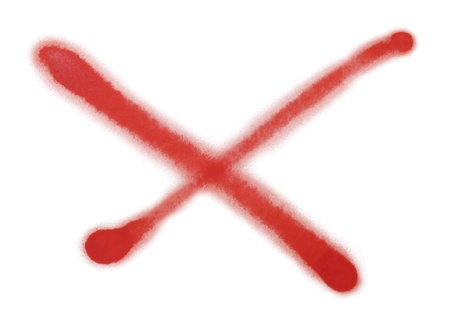 Crossed lines drawn by red spray paint on white background