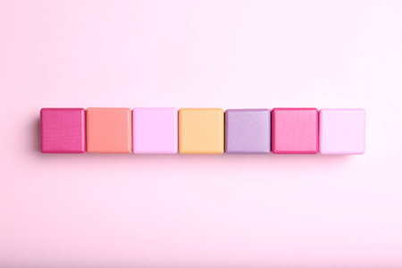 Colorful cubes with word KEYWORD on pink background, flat layの写真素材