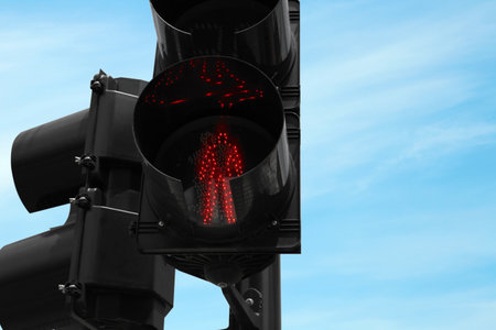 Traffic light for pedestrians on city street, closeup. road rules