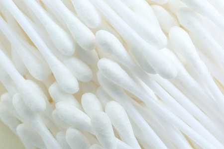 Many cotton buds as background, closeup viewの写真素材