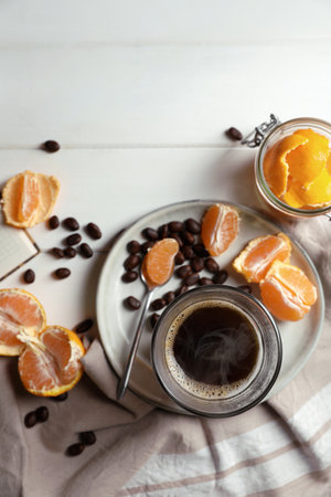 Flat lay composition with fresh ripe tangerines on white wooden table. Space for textの写真素材
