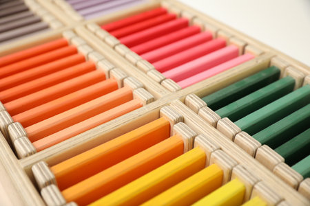 Wooden box with color tablets, closeup. Montessori toyの写真素材