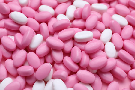 Many bright dragee candies as background, closeup
