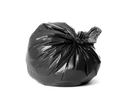 Trash bag full of garbage isolated on white
