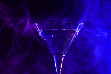 Fresh martini drink in neon lights, closeupの写真素材