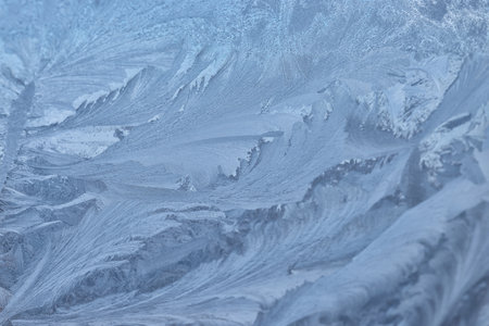 Beautiful frosty window as background, closeup. winter morningの写真素材