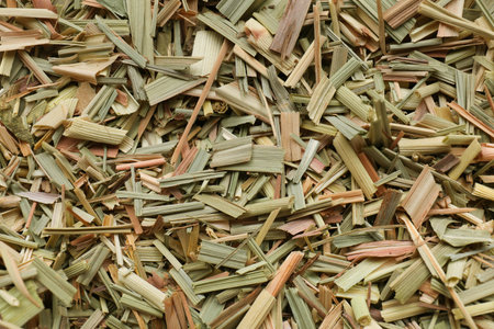 Aromatic dried lemongrass as background, top viewの写真素材