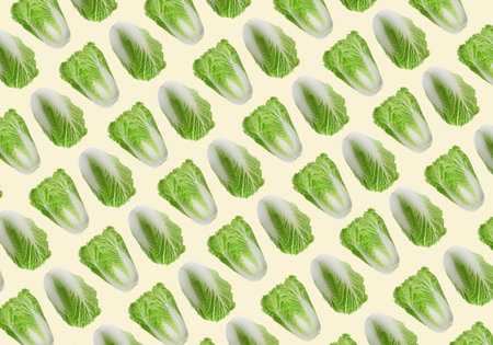 Pattern design with fresh Chinese cabbages on beige backgroundの写真素材
