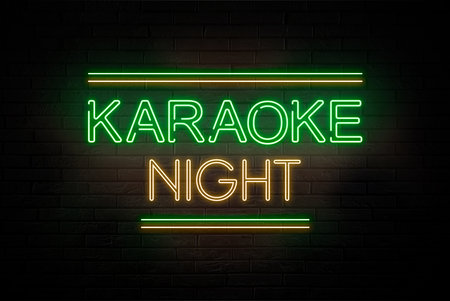 Glowing neon sign with words Karaoke Night on brick wallの写真素材