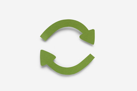 Paper curved arrows on white background, top view. Space for text